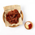 Crunchy BBQ chicken chips served in a rustic bowl with dipping sauce – savory high-protein snack alternative